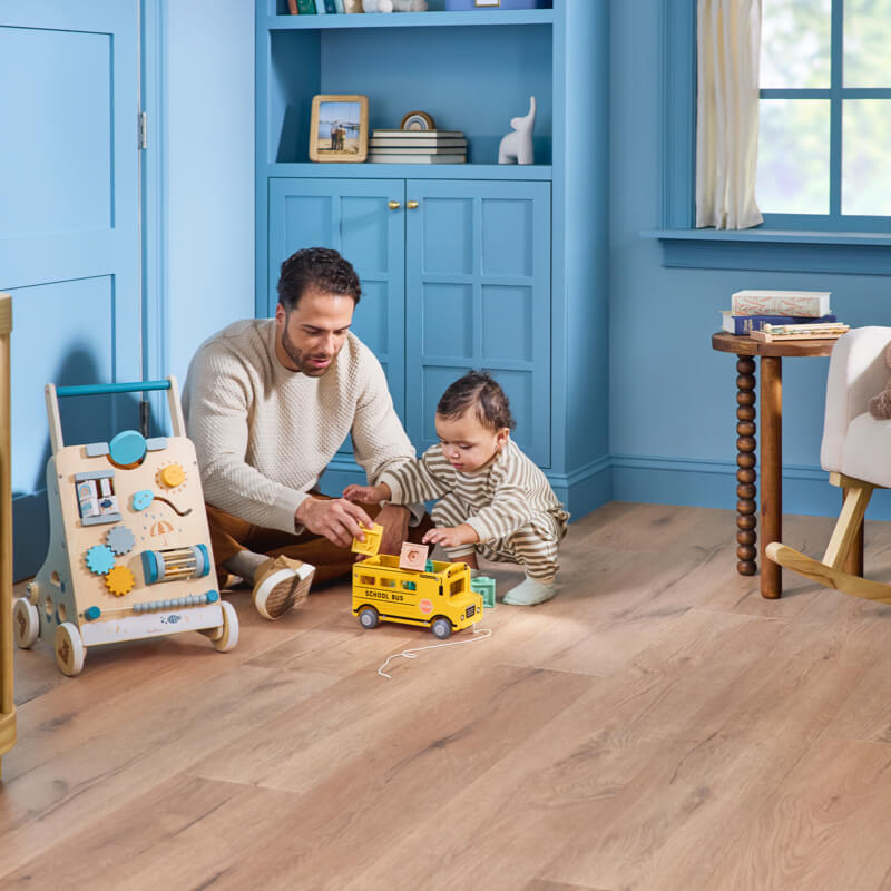 Dad child playing with toys | Randy's Flooring